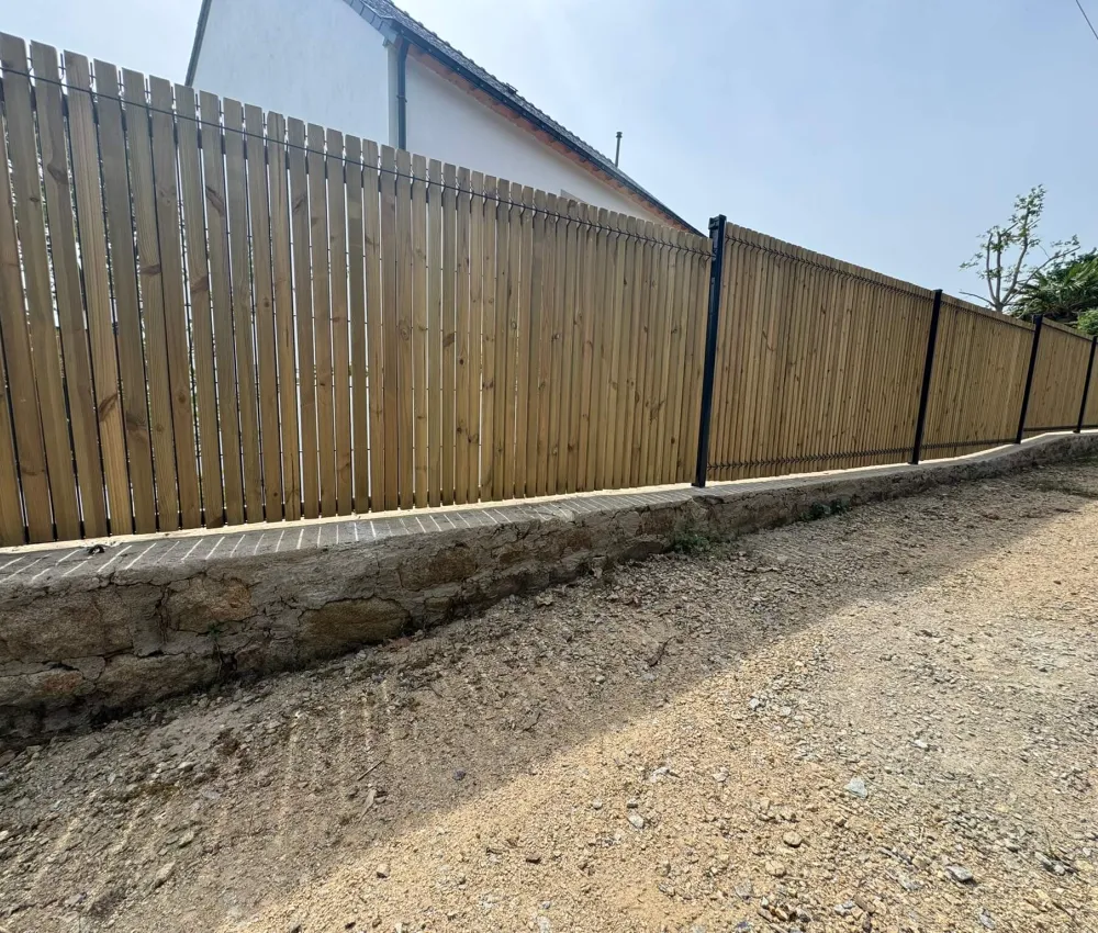 fence with wooden planks and metal posts